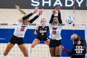Nebraska Cornhusker Taylor Landfair (12) block a shot from Stanford Cardinal Ipar Kurt (15) in the first set during the AVAC First Serve volleyball match on Sunday, Aug. 24, 2025 in Lincoln, Nebraska. Photo by John S. Peterson.