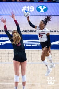 Nebraska Cornhusker Harper Murray (27) bumps the ball over the net against Stanford Cardinal Lizzy Andrew (11) in the first set during the AVAC First Serve volleyball match on Sunday, Aug. 24, 2025 in Lincoln, Nebraska. Photo by John S. Peterson.
