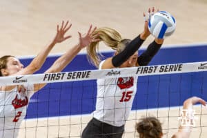 Nebraska Cornhusker Andi Jackson (15) blocks Pittsburgh Panther Dagmar Mourits (19) in the first set during the AVAC Showcase volleyball match on Friday, Aug. 22, 2025, in Lincoln, Nebraska. Photo by John S. Peterson.