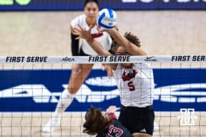 Nebraska Cornhusker Rebekah Allick (5) blocks a spike from Stanford Cardinal Elia Rubin (13) in the second set during the AVAC First Serve volleyball match on Sunday, Aug. 24, 2025 in Lincoln, Nebraska. Photo by John S. Peterson.