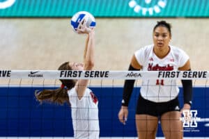 Nebraska Cornhusker Bergen Reilly (2) sets teh ball in the second set against the Stanford Cardinals during the AVAC First Serve volleyball match on Sunday, Aug. 24, 2025 in Lincoln, Nebraska. Photo by John S. Peterson.