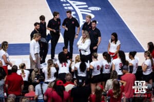 Nebraska Cornhuskers huddle up in a break in the action against the Stanford Cardinals in the second set during the AVAC First Serve volleyball match on Sunday, Aug. 24, 2025 in Lincoln, Nebraska. Photo by John S. Peterson.