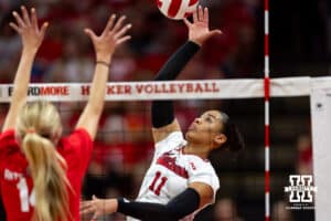 Nebraska Cornhusker Teraya Sigler (11) spiks the ball against the Nebraska alumni in the second set during the Nebraska alumni match on Saturday, Aug. 16, 2025 in Lincoln, Nebraska. Photo by John S. Peterson.