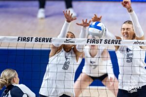 Creighton Bluejay Kiara Reinhardt (5) blocks Penn State Nittany Lion Emmi Sellman (13) with Jaya Johnson (6) in the third set during the AVAC First Serve volleyball match on Saturday, Aug. 23, 2025 in Lincoln, Nebraska. Photo by John S. Peterson.