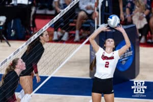 Nebraska Cornhusker Bergen Reilly (2) sets the ball against the Stanford Cardinals in the second set during the AVAC First Serve volleyball match on Sunday, Aug. 24, 2025 in Lincoln, Nebraska. Photo by John S. Peterson.