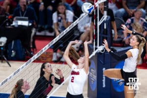 Nebraska Cornhusker Bergen Reilly (2) sets the ball for Andi Jackson (15) against the Stanford Cardinals in the second set during the AVAC First Serve volleyball match on Sunday, Aug. 24, 2025 in Lincoln, Nebraska. Photo by John S. Peterson.