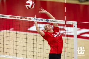 Nebraska alumnus Kelly (Hunter) Natter (3) dumps the ball against the Nebraska Cornhuskers for a point in the second set during the Nebraska alumni match on Saturday, Aug. 16, 2025 in Lincoln, Nebraska. Photo by John S. Peterson.