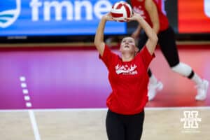 Nebraska alumnus Kelly (Hunter) Natter (3) sets the ball against the Nebraska Cornhuskers in the third set during the Nebraska alumni match on Saturday, Aug. 16, 2025 in Lincoln, Nebraska. Photo by John S. Peterson.