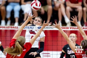 Nebraska Cornhusker Kenna Cogill (8) spikes the ball against Nebraska alumnus Callie Schwarzenbach (25) and Nebraska alumnus Lindsay Krause (22) in the third set during the Nebraska alumni match on Saturday, Aug. 16, 2025 in Lincoln, Nebraska. Photo by John S. Peterson.