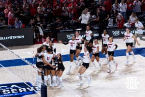 Nebraska Cornhuskers celebrate the win over the Stanford Cardinals in three sets during the AVAC First Serve volleyball match on Sunday, Aug. 24, 2025 in Lincoln, Nebraska. Photo by John S. Peterson.