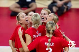 Nebraska alumni having fun celebrating a point agains the the Nebraska Cornhuskers in the third set during the Nebraska alumni match on Saturday, Aug. 16, 2025 in Lincoln, Nebraska. Photo by John S. Peterson.