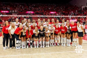 The Nebrask Cornhuskers and the alumni teams pose for a group photo after the Nebraska Alumni Match on Saturday, Aug. 16, 2025 in Lincoln, Nebraska. Photo by John S. Peterson.