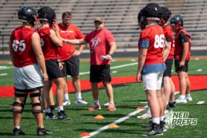 Head Coach Paul Limongi talks with players during Westside football practice on Tuesday, August 12th, 2025 in Omaha Nebraska. Photo by Brandon Tiedemann.