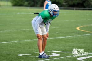 Christin Bolles lines up during Millard North football practice on Saturday, August 16th, 2025 in Omaha, Nebraska. Photo by Brandon Tiedemann.