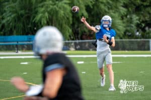 Cameron Leggett throws to a receiver during Millard North football practice on Saturday, August 16th, 2025 in Omaha, Nebraska. Photo by Brandon Tiedemann.