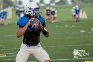 Zion Rush drops back during Millard North football practice on Saturday, August 16th, 2025 in Omaha, Nebraska. Photo by Brandon Tiedemann.