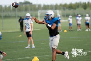 Zion Rush throws a pass during Millard North football practice on Saturday, August 16th, 2025 in Omaha, Nebraska. Photo by Brandon Tiedemann.