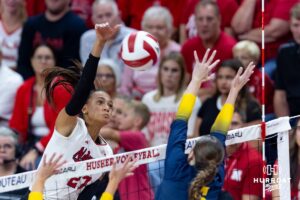 Nebraska Cornhusker Harper Murray (27) sikes the bal agianst Michigan Wolvine setter Ellie White (6) in the first set during a college volleyball match on Wednesday, September 24, 2025, in Lincoln, Nebraska. Photo by John S. Peterson.