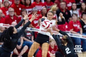 Nebraska Cornhusker Andi Jackson (15) spikes the ball against Wright State Raider Reilly Zegunis (2) in the first set during a college volleyball match on Friday, September 5, 2025 in Lincoln, NE. Photo by John S. Peterson.