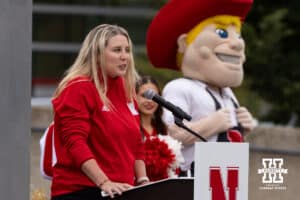 Nebraska volleyball head coach Dani Busboom Kelly speaks during the John Cook Statue dedication on Thursday, September 18, 2025, in Lincoln, Nebraska. Photo by John S. Peterson.