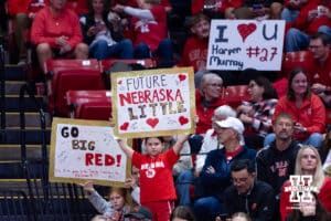Nebraska Cornhuskers fans holding signs during a college volleyball match State Spartans on Saturday, October 25, 2025, in Lincoln, Nebraska. Photo by John S. Peterson.