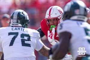 Nebraska Cornhusker linebacker Javin Wright takes on Michigan State Spartan offensive lineman Caleb Carter (72) in the first quarter during a college football game on Saturday, October 4, 2025, in Lincoln, Nebraska. Photo by John S. Peterson.