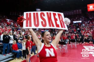 Nebraska Cornhusker Cheer Squad member performing Husker Power during a college volleyball match against the Michigan State Spartans on Saturday, October 25, 2025, in Lincoln, Nebraska. Photo by John S. Peterson.