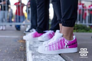 Nebraska Cornhuskers wearing custom shoes for cancer awareness for the college football game between Nebraska and Minnesota on Friday, October 17, 2025, in Minneapolis, Minnesota. Photo by John S. Peterson.