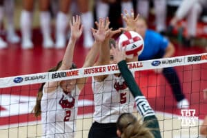Nebraska Cornhusker setter Bergen Reilly (2) and Nebraska Cornhusker middle blocker Rebekah Allick (5) block a spike from Michigan State Spartans in the first set during a college volleyball match on Saturday, October 25, 2025, in Lincoln, Nebraska. Photo by John S. Peterson.