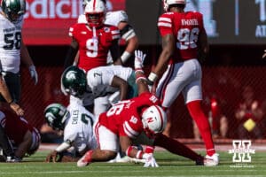 Nebraska Cornhusker defensive lineman Elijah Jeudy (16) does a Spiderman celebration after a tackle in the second quarter against the Michigan State Spartans during a college football game on Saturday, October 4, 2025, in Lincoln, Nebraska. Photo by John S. Peterson.