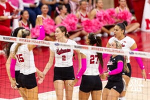 Nebraska Cornhusker setter Bergen Reilly (2) and the Huskers celebrates a point against the Northwestern Wildcats in the first set during a college volleyball match on Friday, October 24, 2025, in Lincoln, Nebraska. Photo by John S. Peterson.