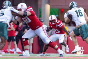 Nebraska Cornhusker running back Emmett Johnson (21) runs with the ball against the Michigan State Spartans in the fourth quarter during a college football game on Saturday, October 4, 2025, in Lincoln, Nebraska. Photo by John S. Peterson.
