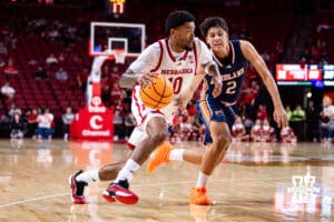 Nebraska Cornhusker Jamarques Lawrence (10) drives the lane against Midland Viking guard Amari Rahaman (2) in the second half during a college men’s basketball exhibition game on Monday, October 27, 2025, in Lincoln, Nebraska. Photo by John S. Peterson.