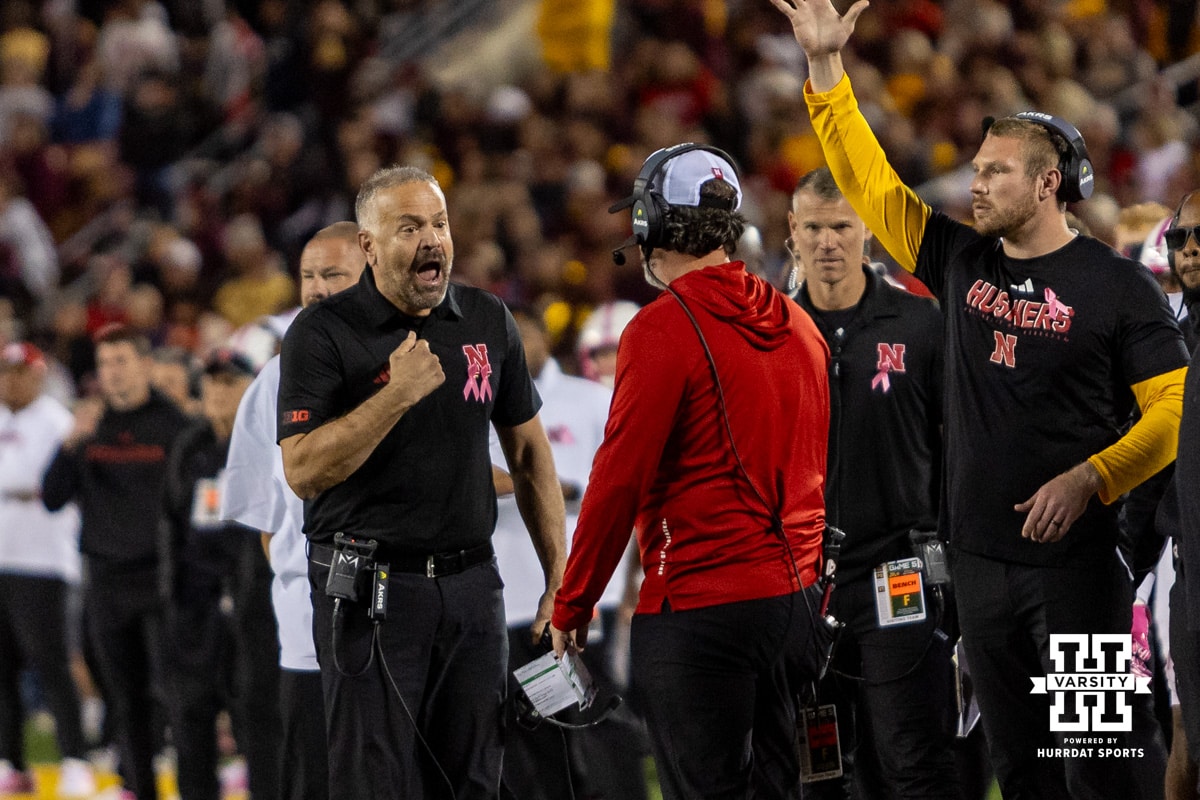 Nebraska Cornhusker head coach Matt Rhule talks to assistant coach John Butler against the Minnesota Golden Gophers during a college football game on Friday, October 17, 2025, in Minneapolis, Minnesota. Photo by John S. Peterson.