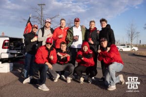 Nebraska Cornhusker fans tailgating in the parking lot before the college men’s basketball game against the Oklahoma Sooners on Saturday, Nov 15, 2025, in Sioux Falls, South Dakota. Photo by John S. Peterson.