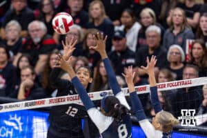 Nebraska Cornhuskers line up for the National Anthem against the Penn State Nittany Lions during the blackout volleyball match on Friday, Nov. 28, 2025, in Lincoln, Nebraska. Photo by John S. Peterson.