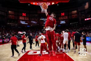 Nebraska Cornhusker guard Connor Essegian (0) makes a dunk warming for Winthrop Eagles before a college basketball game on Tuesday, Nov. 25, 2025, in Lincoln, Nebraska. Photo by John S. Peterson.