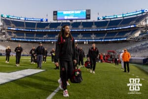 Nebraska Cornhusker quarterback TJ Lateef heads to the locker room after the team met on the field after their arrival during a college football game against the Penn State Nittany Lions on Saturday, Nov. 22, 2025, in State College, PA. Photo by John S. Peterson.
