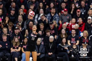 Nebraska Cornhusker middle blocker Andi Jackson (15) serves the ball against the Penn State Nittany Lions in the first set during a volleyball match on Friday, Nov. 28, 2025, in Lincoln, Nebraska. Photo by John S. Peterson.