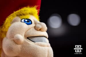 Nebraska Cornhuskers mascot Herbie performing at a break in the aciton against the South Carolina Upstate Spartans during a college basketball game on Saturday, November 29, 2025, in Lincoln, Nebraska. Photo by John S. Peterson.