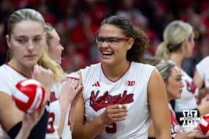 Nebraska Cornhusker middle blocker Rebekah Allick (5) shares a laugh before introductions during a college volleyball match against the Illinois Fighting Illini on Thursday, November 6, 2025, in Lincoln, Nebraska. Photo by John S. Peterson.