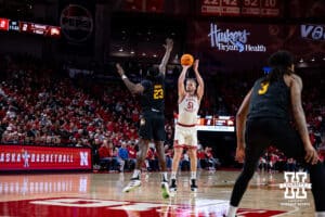 Nebraska Cornhusker forward Rienk Mast (51) makes a three-point shot against Winthrop Eagle center Edward Nnamoko (23) in the first half during a college basketball game on Tuesday, Nov. 25, 2025, in Lincoln, Nebraska. Photo by John S. Peterson.