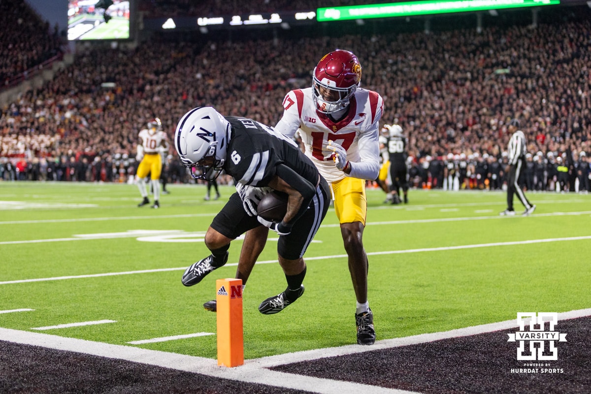 makes a catch for a touchdown against Southern California Trojan cornerback Decarlos Nicholson (17) in the first quarter during a college football game on Saturday, November 1, 2025, in Lincoln, Nebraska. Photo by John S. Peterson.