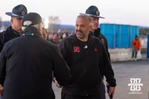 Nebraska Cornhusker head coach Matt Rhule shakes hand with Nebraska president Jeff Gold during the arrival before a college football game against the Penn State Nittany Lions on Saturday, Nov. 22, 2025, in State College, PA. Photo by John S. Peterson.