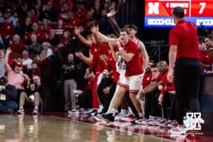 Nebraska Cornhuskers bench celebrates Sandfort three-point shot against the Winthrop Eagles in the first half during a college basketball game on Tuesday, Nov. 25, 2025, in Lincoln, Nebraska. Photo by John S. Peterson.