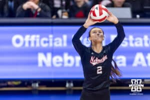 Nebraska Cornhusker setter Bergen Reilly (2) sets the ball against the Penn State Nittany Lions in the second set during a volleyball match on Friday, Nov. 28, 2025, in Lincoln, Nebraska. Photo by John S. Peterson.