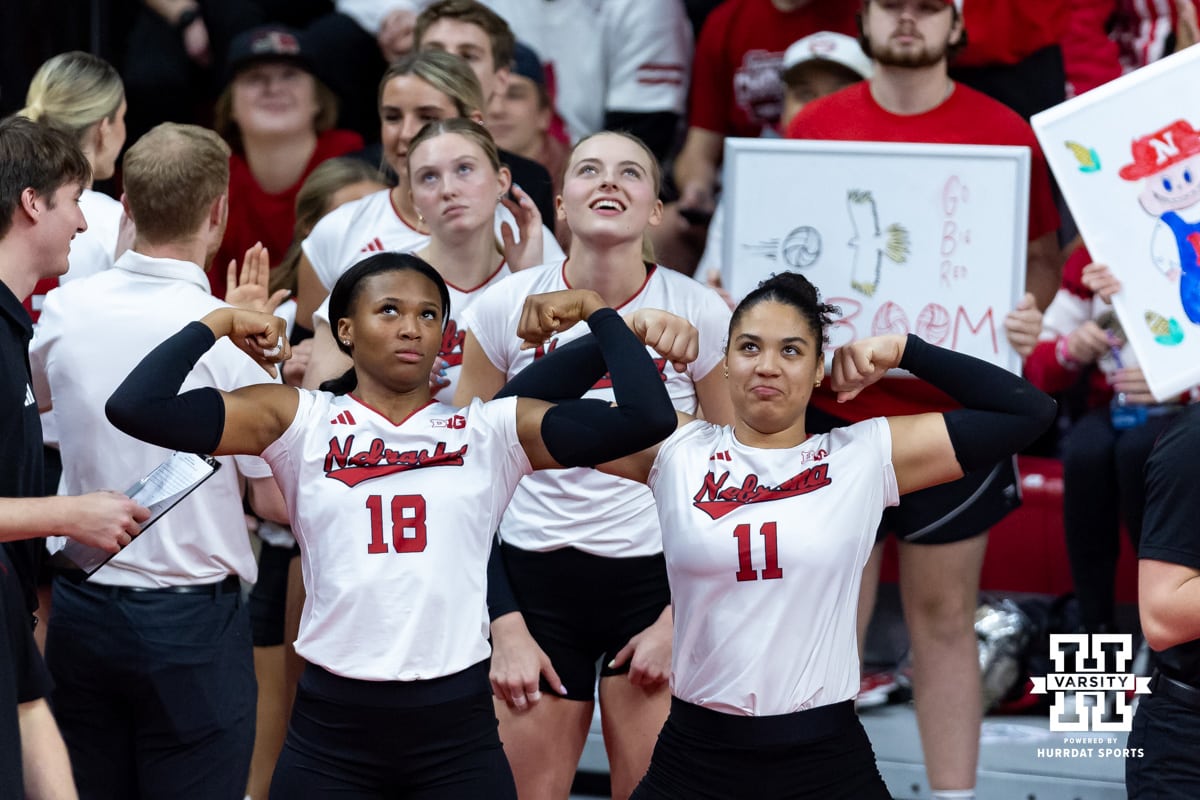 Nebraska Cornhusker opposite Ryan Hunter (18) and outside hitter Teraya Sigler (11) having funs flexing for the flex cam during a college volleyball match against the Iowa Hawkeyes on Thursday, Nov. 20, 2025, in Lincoln, Nebraska. Photo by John S. Peterson.