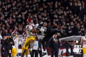 Nebraska Cornhusker defensive back Andrew Marshall (10) makes an interception against Southern California Trojan wide receiver Ja'Kobi Lane (8) during a college football game on Saturday, November 1, 2025, in Lincoln, Nebraska. Photo by John S. Peterson.