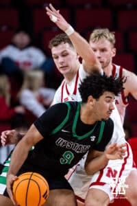 Nebraska Cornhusker guard Cale Jacobsen (31) defends against South Carolina Upstate Spartan guard Mason Bendinger (9) during a college basketball game on Saturday, November 29, 2025, in Lincoln, Nebraska. Photo by John S. Peterson.