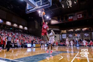 Nebraska Cornhusker guard Jamarques Lawrence (10) makes a lay up agianst Oklahoma Sooner guard Xzayvier Brown (1) in the second half during a college men’s basketball game on Saturday, Nov 15, 2025, in Sioux Falls, South Dakota. Photo by John S. Peterson.